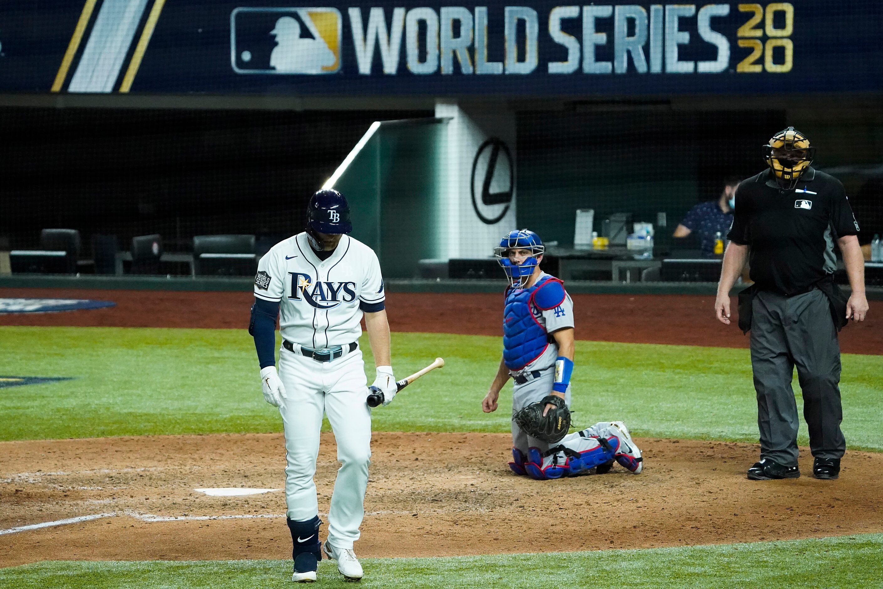 Tampa Bay Rays designated hitter Austin Meadows heads back to the dugout after striking out...