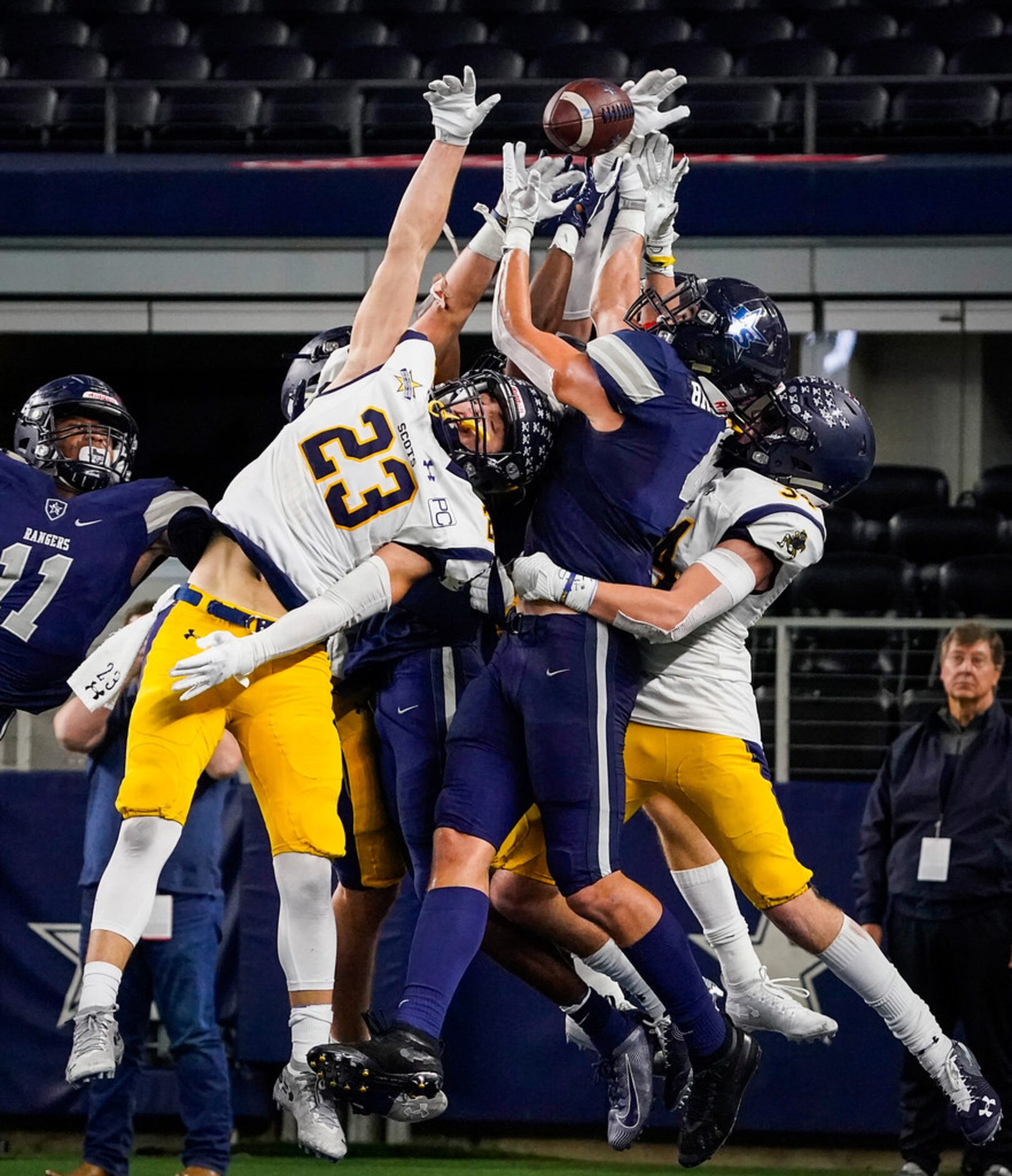 Highland Park defensive back Andrew Bonnet (23) and Frisco Lone Star wide receiver Trace...