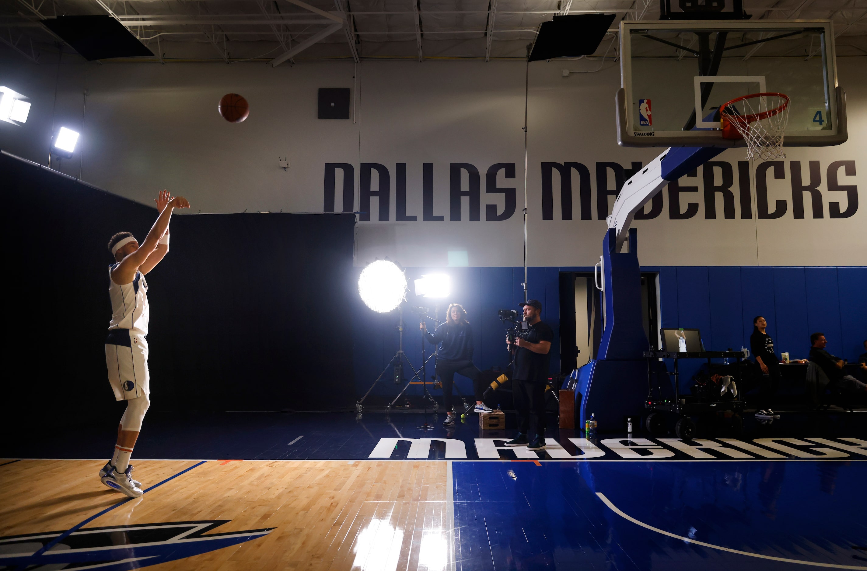 Dallas Mavericks forward Klay Thompson  takes shots at the basket as he finishes doing a...