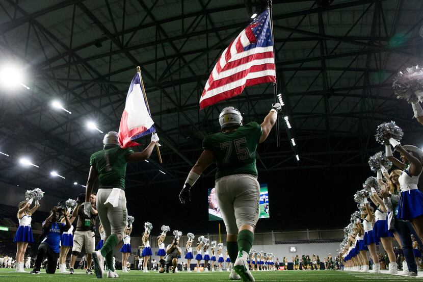 Frisco Reedy players take the field for their non district football game against the The...