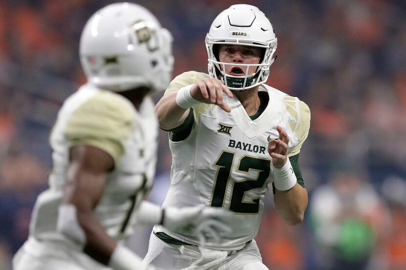 FILE - In this Sept. 8, 2018, file photo, Baylor quarterback Charlie Brewer (12) throws to...