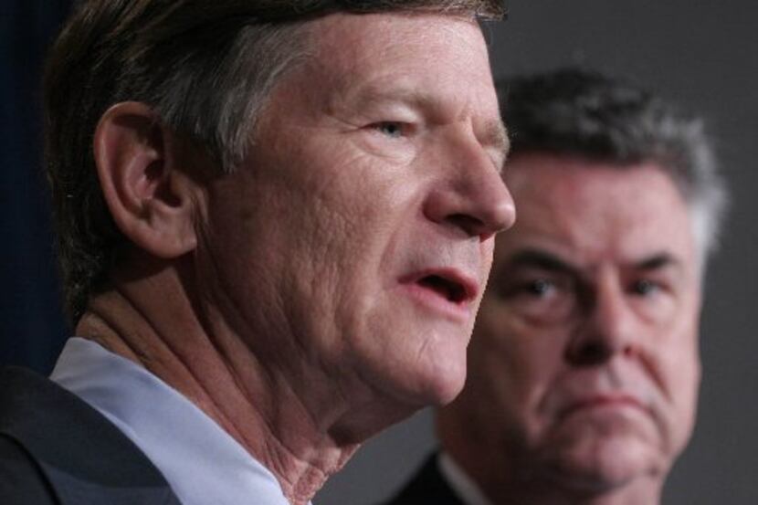 Rep. Lamar Smith, R-Texas (left) accompanied by Rep. Peter King, R-N.Y, speaks to reporters...