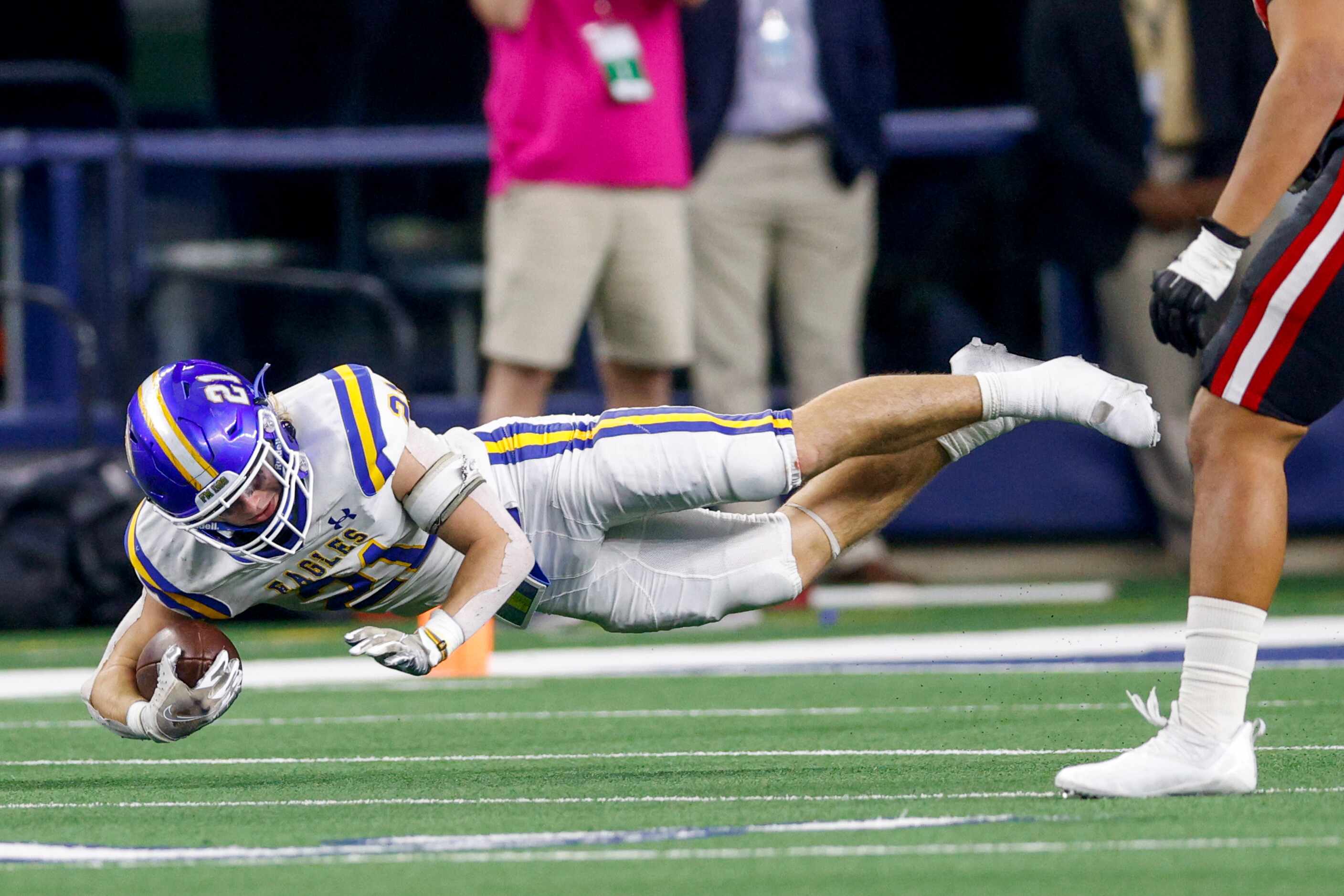 DUPLICATE***Brock running back Kutter Wilson (21) dives forward with the ball during the...