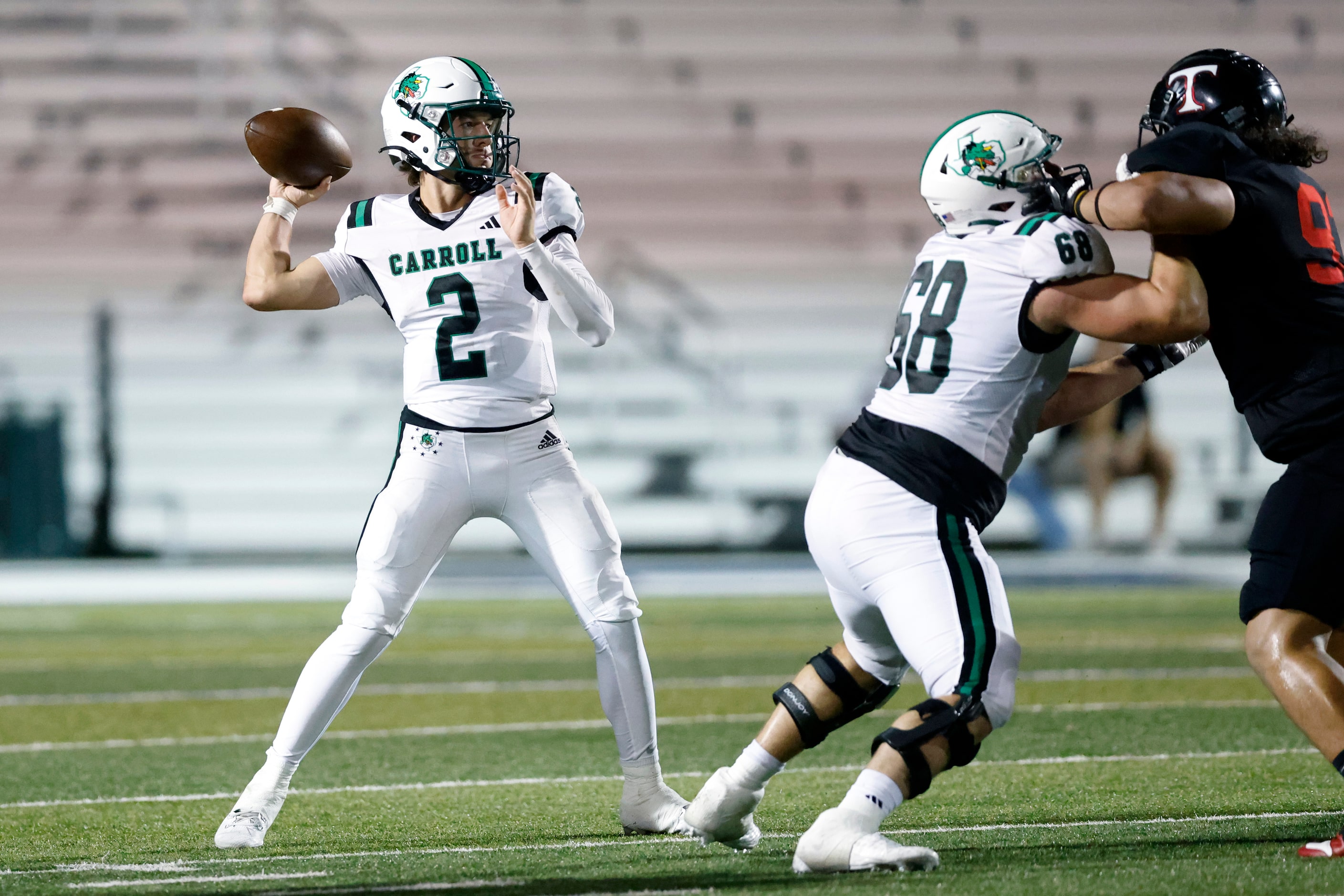 Southlake Carroll quarterback Angelo Renda (2) throws a pass as offensive lineman Trent...