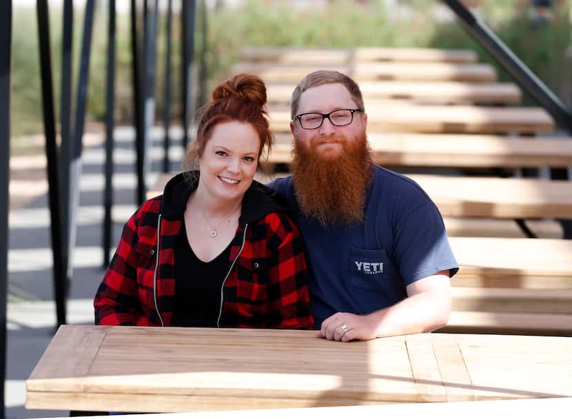 Travis and Emma Heim sit on the patio of their new Dallas restaurant at 3130 W. Mockingbird...