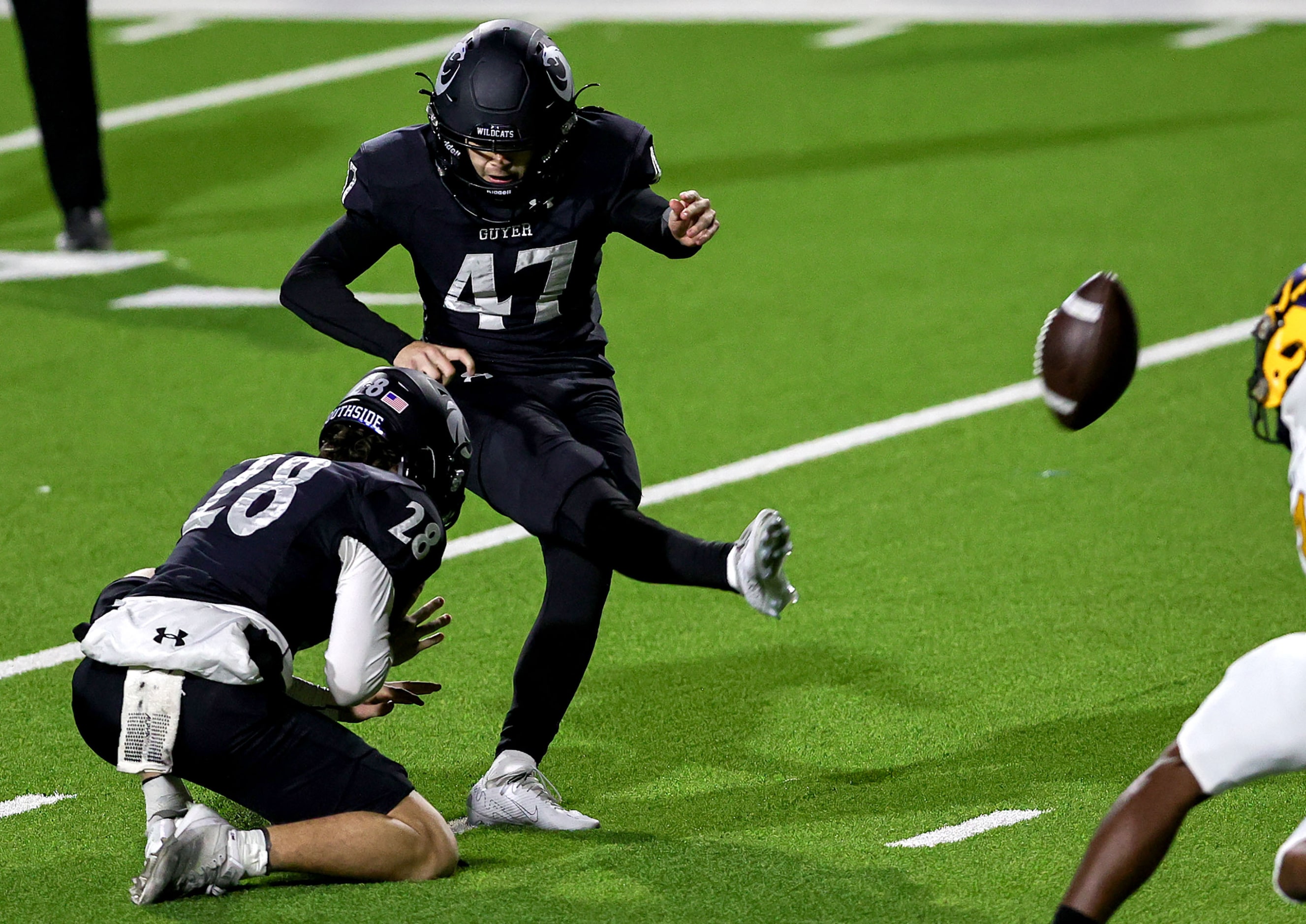 Denton Guyer kicker Ford Stinson makes a 43 yard field goal against McKinney during the...