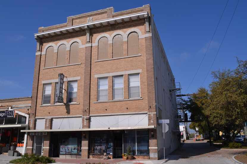 McKinney's Masonic Lodge in 2015 had its 8-foot windows on the third floor covered up with...