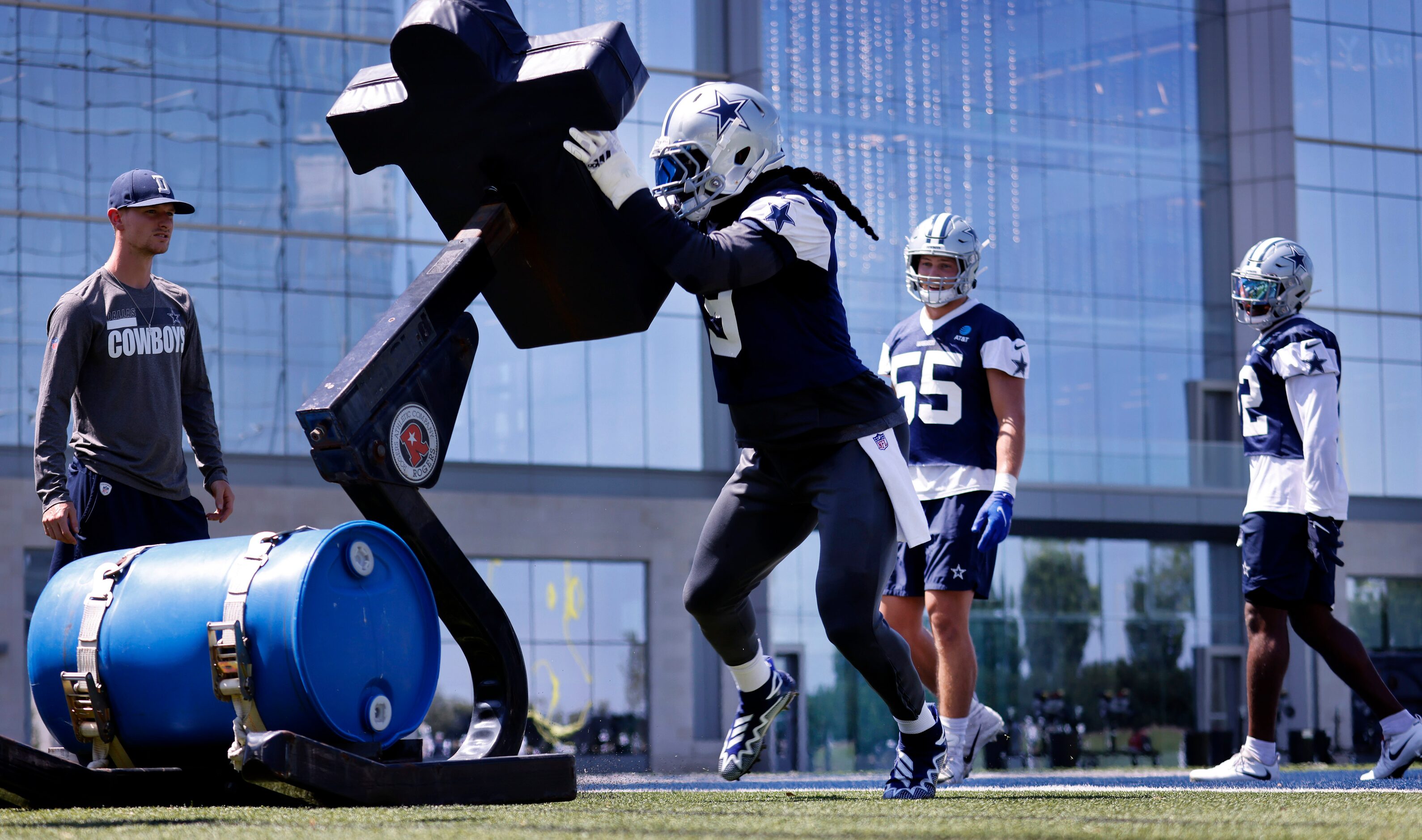 Dallas Cowboys linebacker Jaylon Smith (9) hits the blocking dummies during Training Camp...