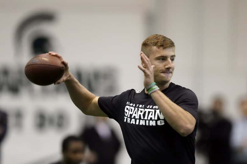 Quarterback Connor Cook throws during a drill for NFL scouts at a Pro Day college football...