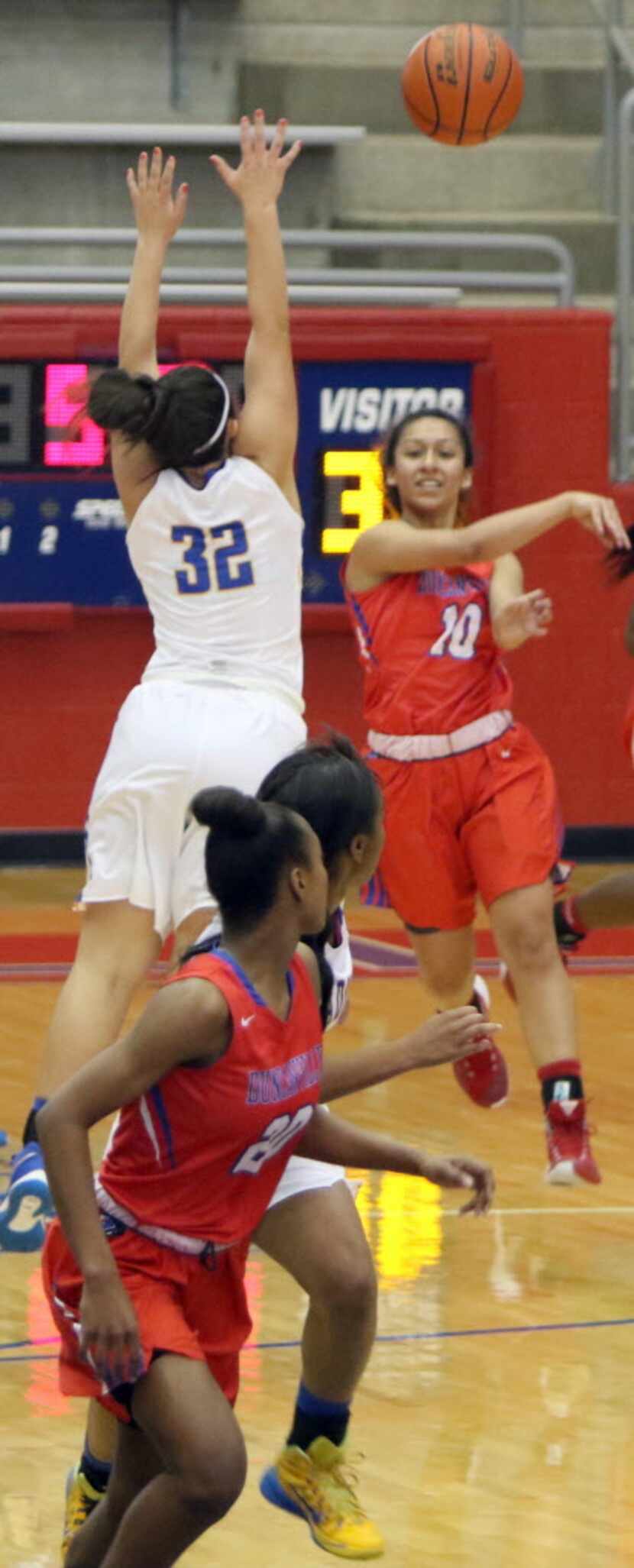 Duncanville guard Nina Alvarez (10) launches a long pass beyond the defense of Garland...