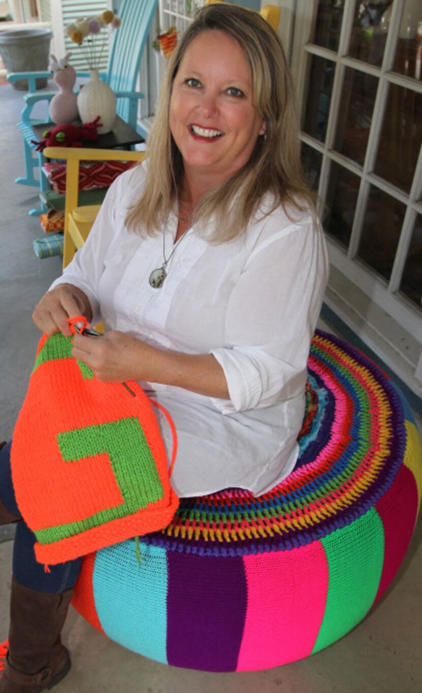 Shabby Sheep owner Ronda Van Dyk is coordinating the new park's yarn bombing.