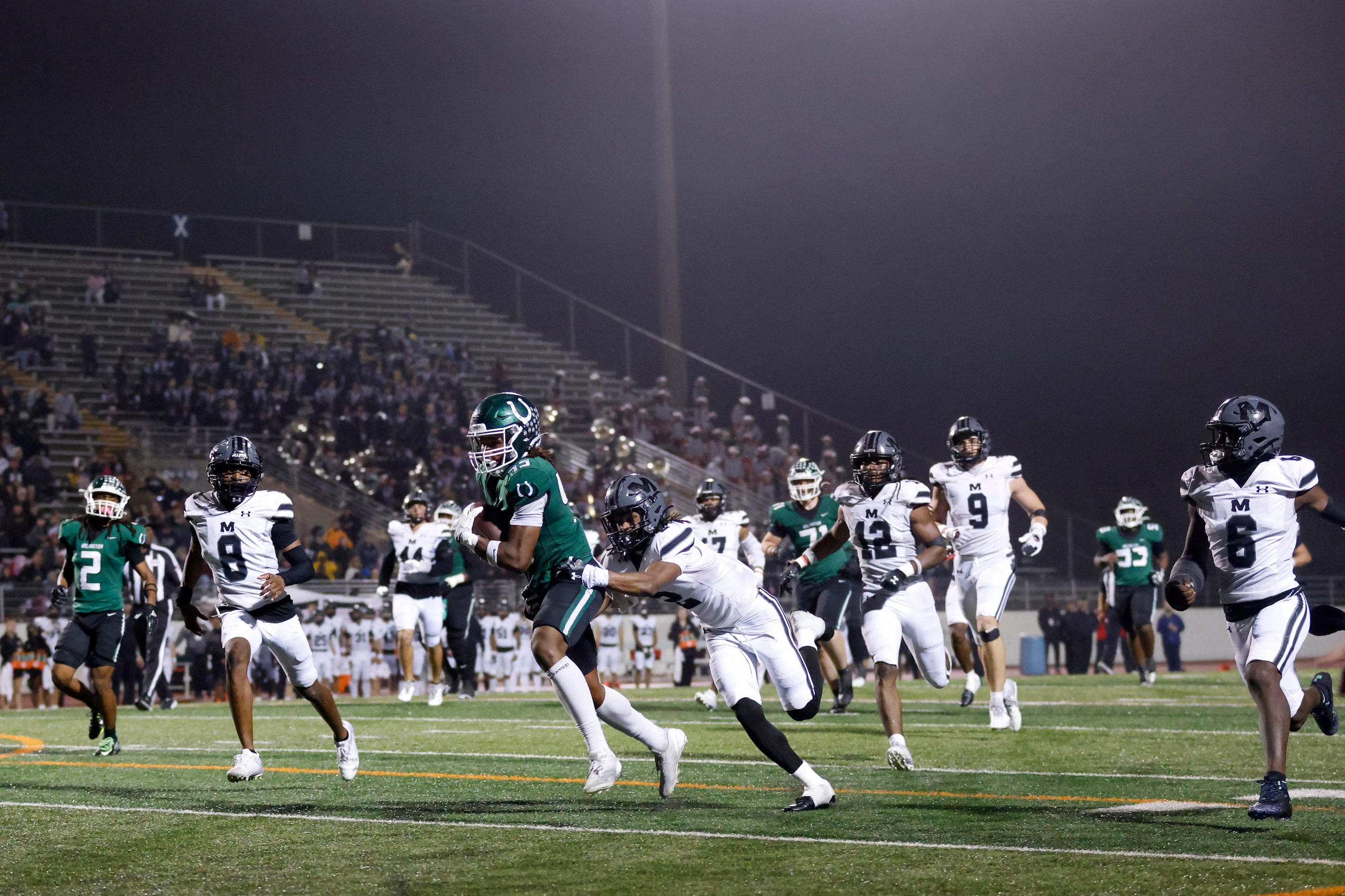 Arlington High wide receiver Isaiah Robertson (45) races for the end zone for a second half...