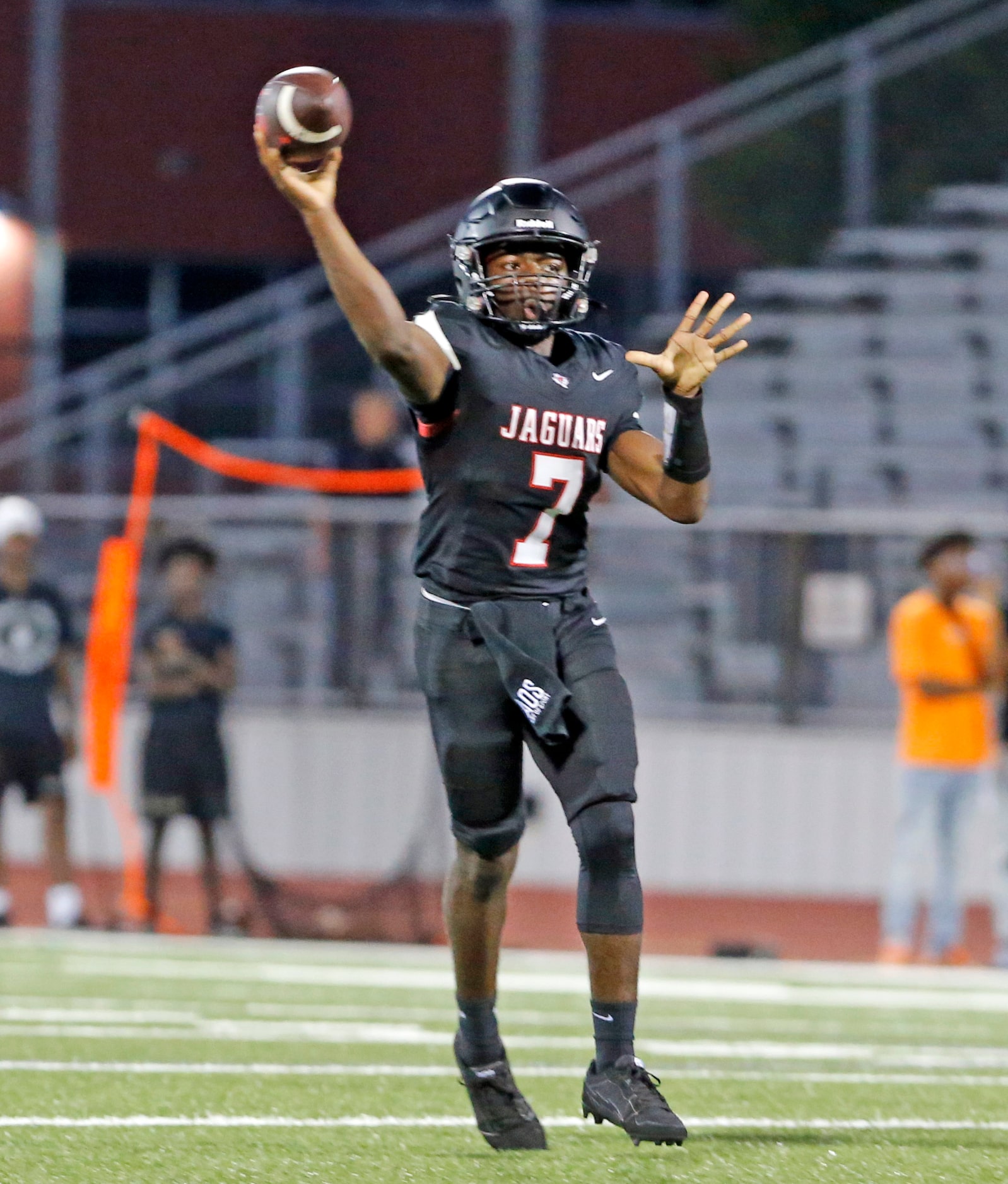 Mesquite Horn QB C.J. Daughtry (7) throws a pass during the first half of a high school...