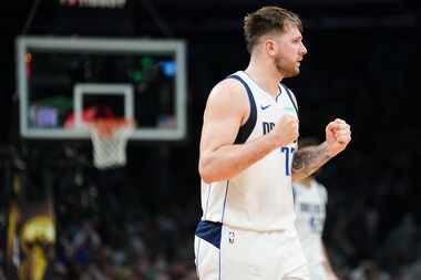 Dallas Mavericks guard Luka Doncic celebrates after a basket during the first half in Game 2...