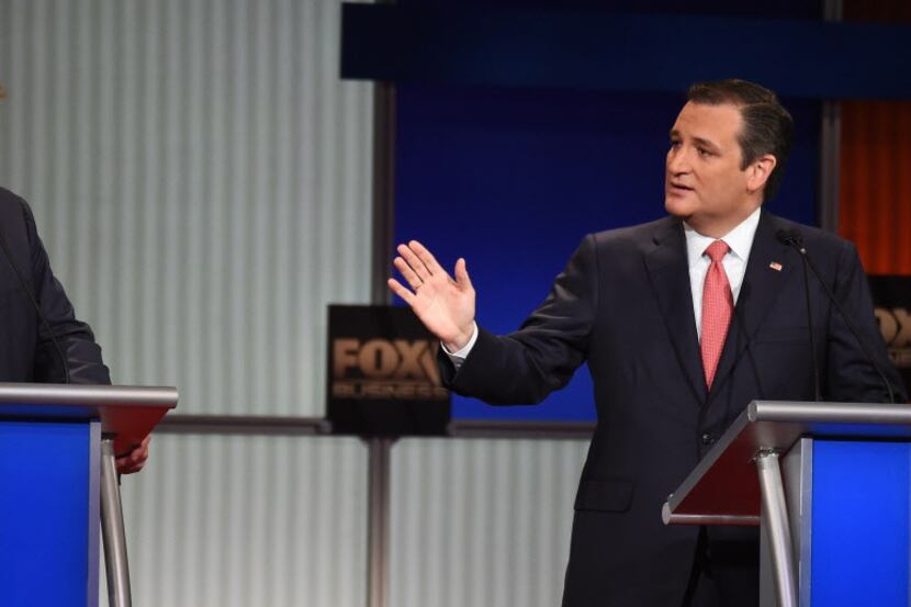  Republican presidential candidates Donald Trump and Ted Cruz speak during the Fox Business...