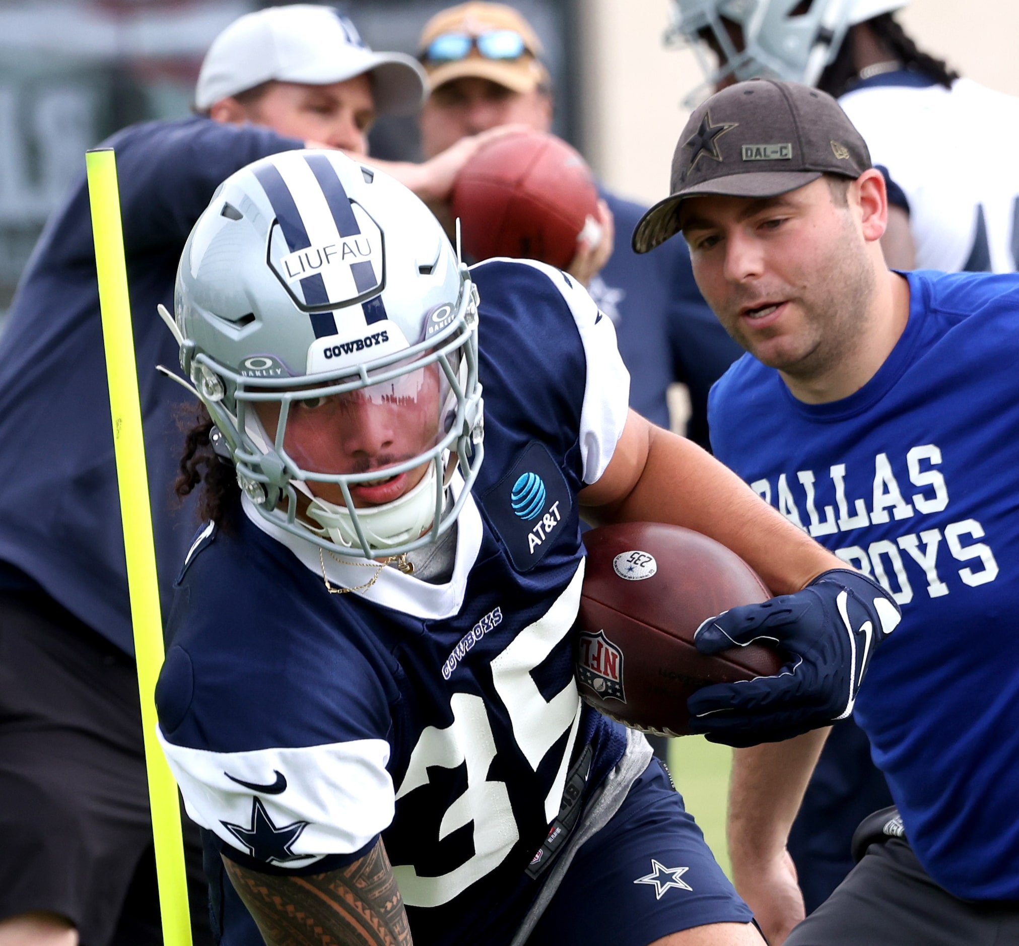 Dallas Cowboys linebacker Marist Liufau (35) works his way through a running drill under the...