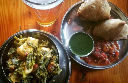 Saag paneer, lamb samosas and a local brew hit the spot at Bollywood Theater PDX.