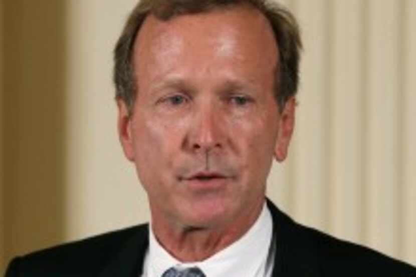  Neil Bush, a Houston businessman, speaks during an event at the White House. He and his...