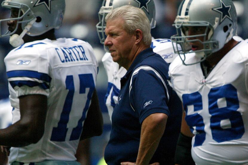 IRVING, Texas:  Cowboys head coach Bill Parcells watches his players before the season...