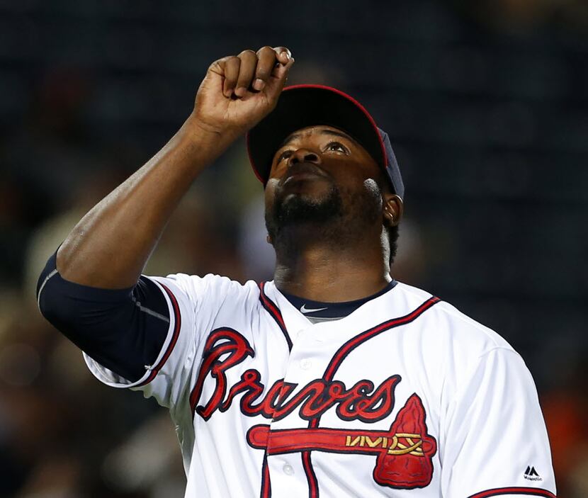 Atlanta Braves relief pitcher Arodys Vizcaino reacts after striking out a batter during the...