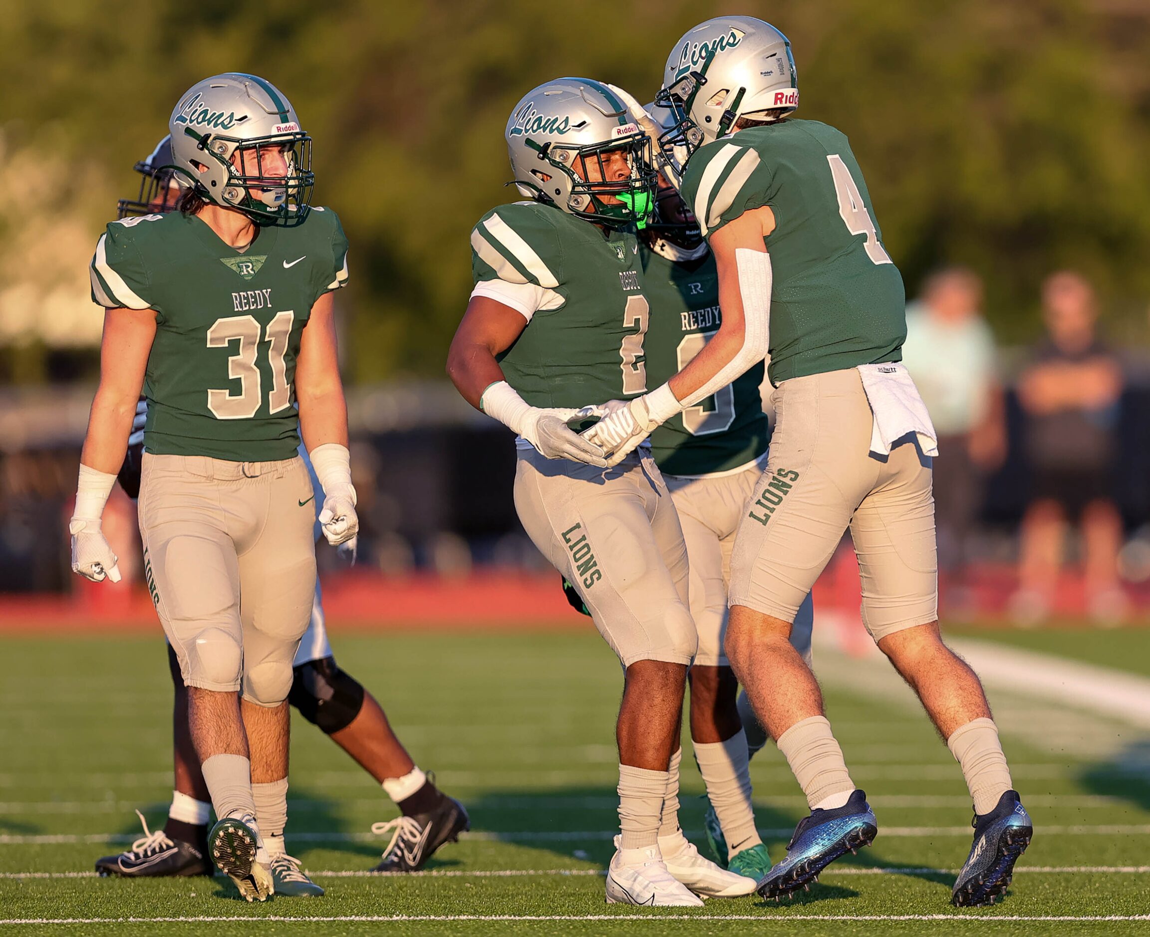 Frisco Reedy safety Will Rubalcava (4) and linebacker Kahlil Smith (2) celebrate a stop...