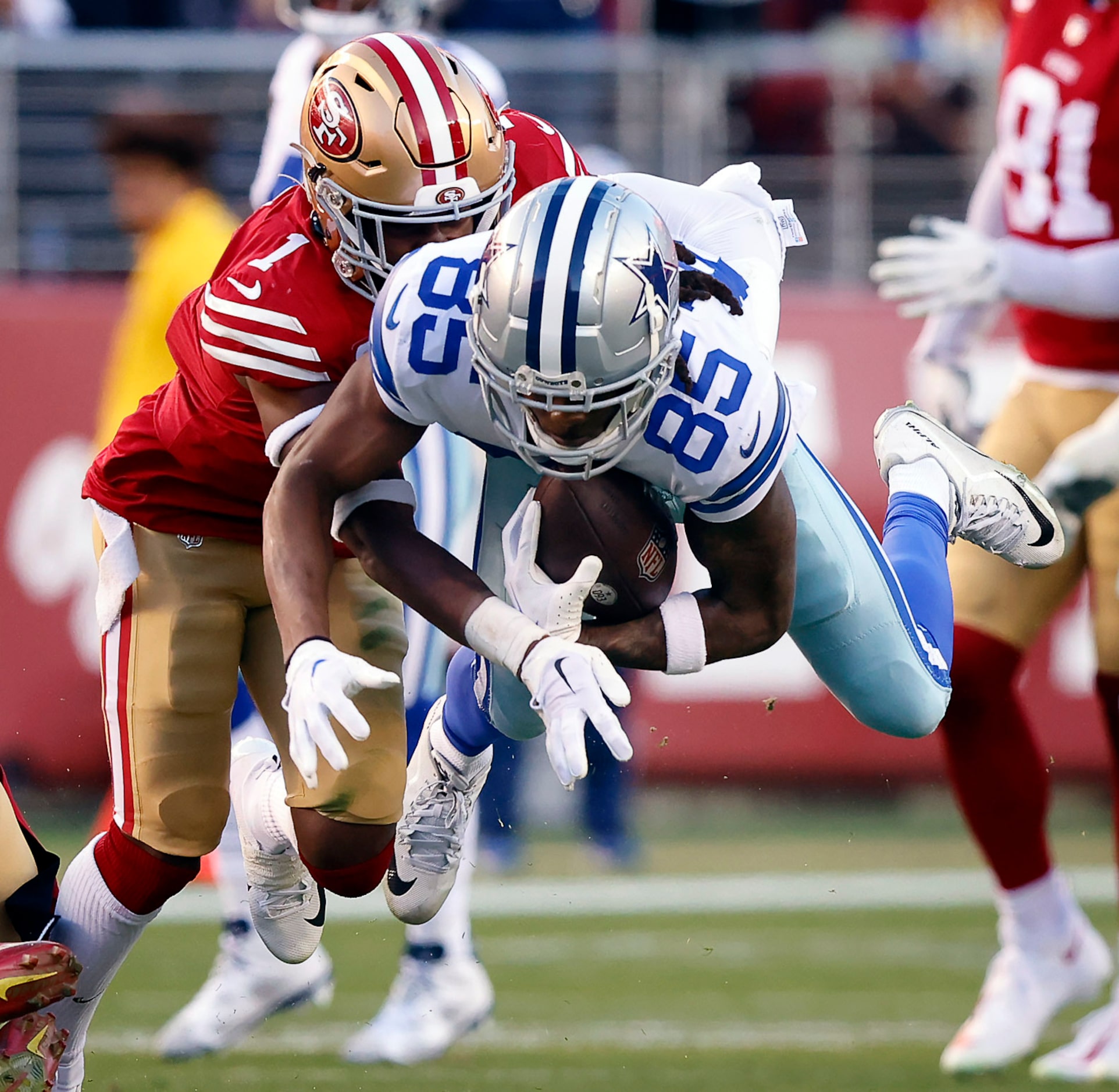 Dallas Cowboys wide receiver Noah Brown (85) went airborne as he gets tackled by San...