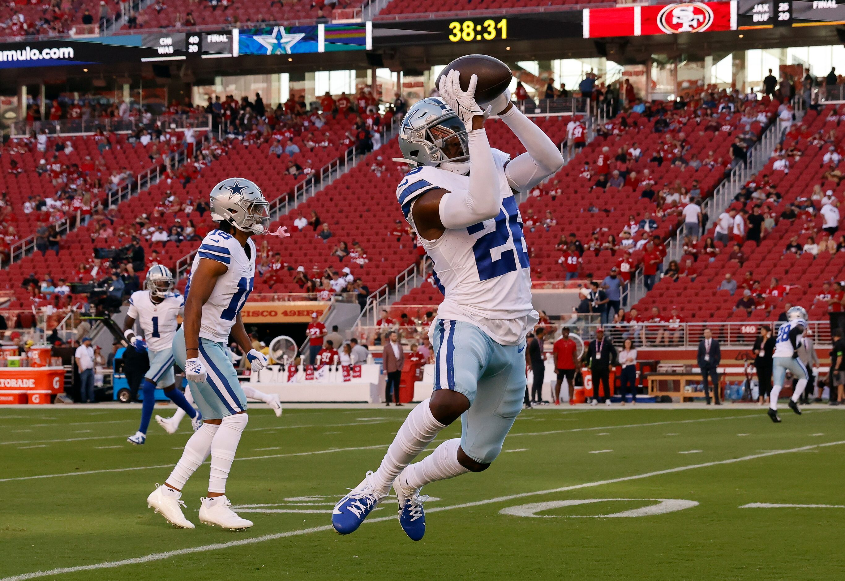 Dallas Cowboys cornerback DaRon Bland (26) caches a pass during pregame warmups before...