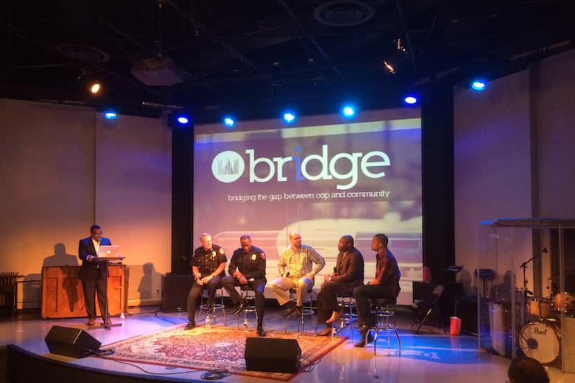  From left: moderator Markus Lloyd of Woodcreek Church in Richardson and the panelists --...