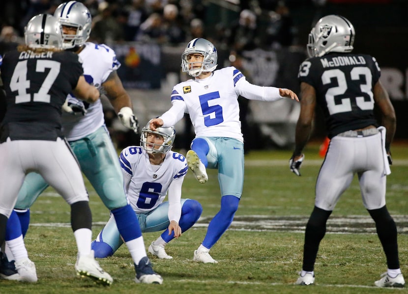 FILE - Cowboys kicker Dan Bailey (5) kicks a field goal during a game against the Raiders at...