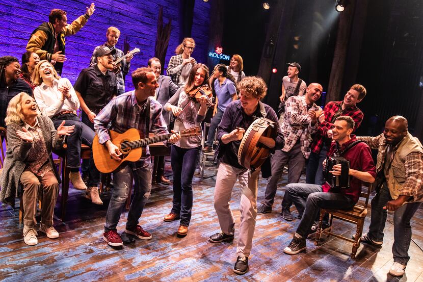 The North American touring cast of "Come From Away" in an exuberant moment, including...