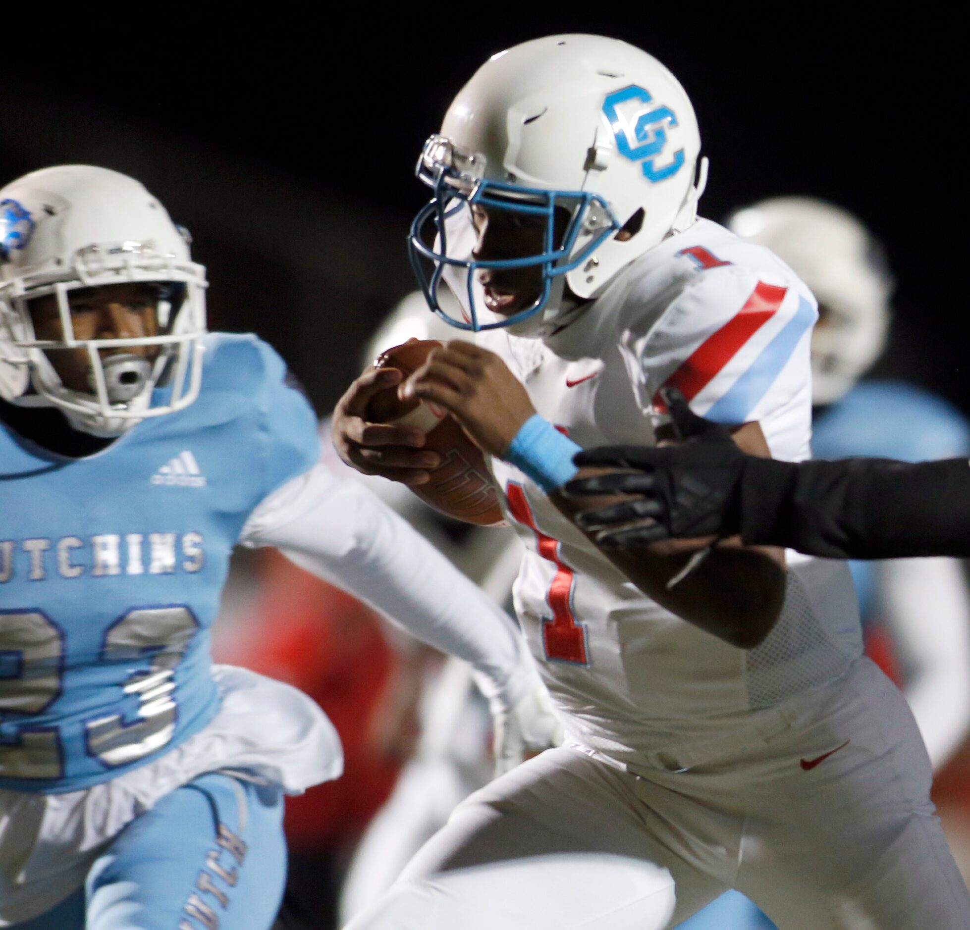 Dallas Carter quarterback Kace Williams (1) cuts inside and scores a rushing touchdown past...