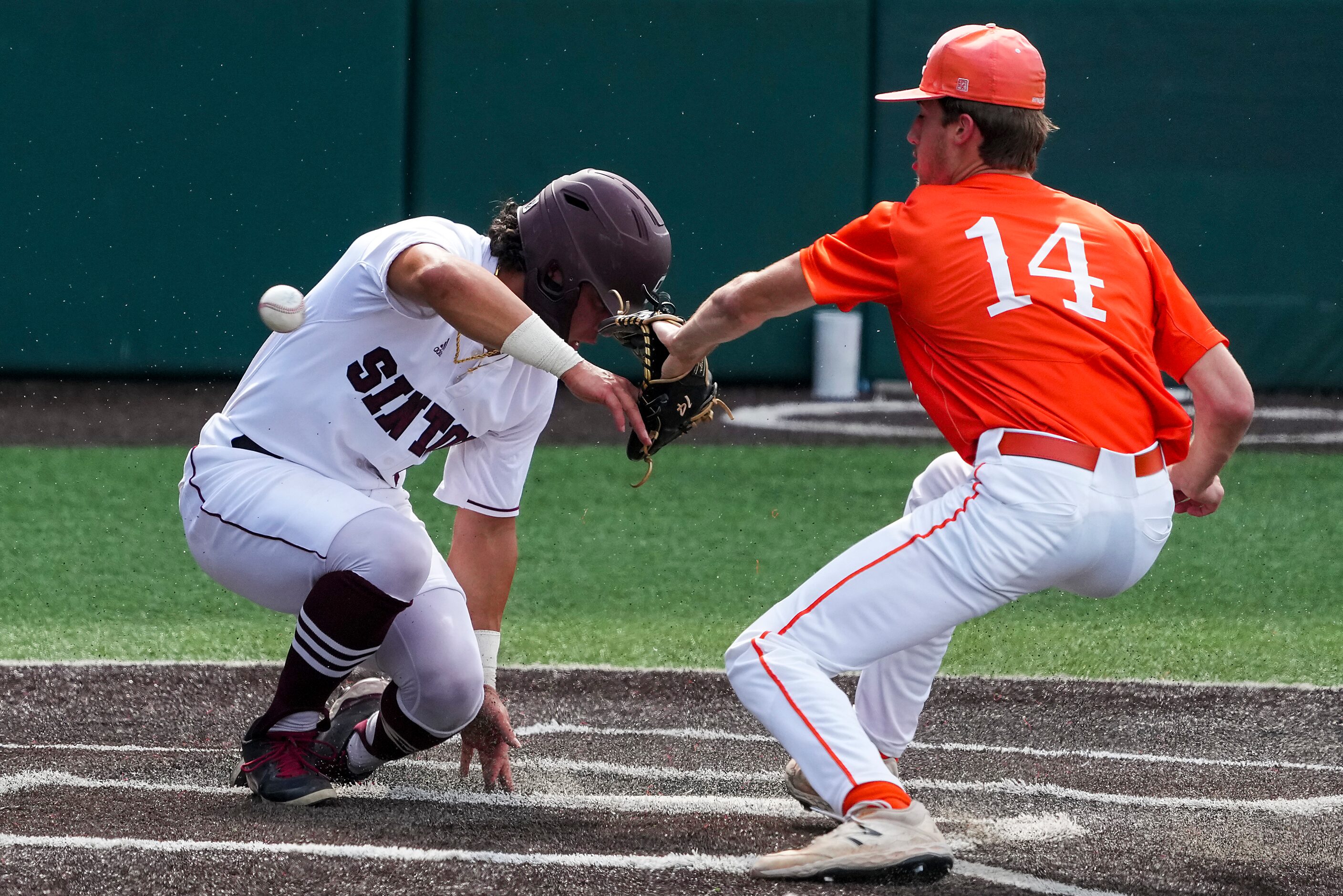 Sinton outfielder Rene Galvan (4) scores on a wild pitch past Celina pitcher Cole...