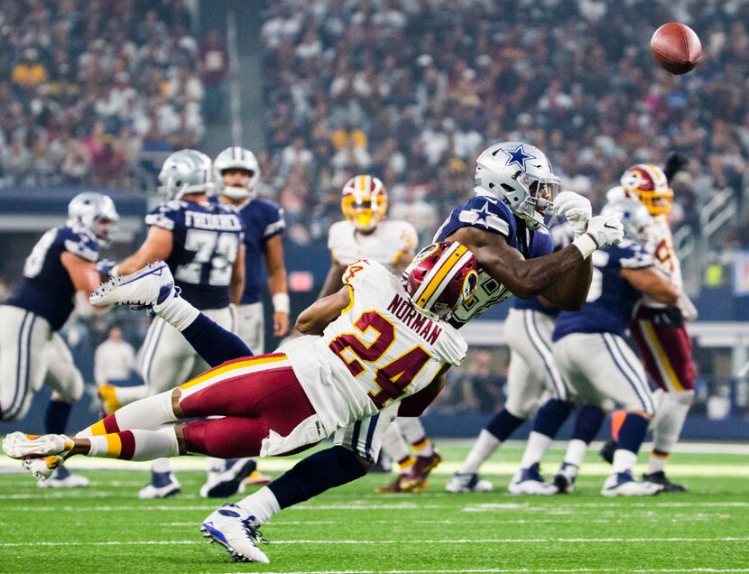 FILE - The ball slips away from Cowboys wide receiver Dez Bryant (88) as he's tackled by...