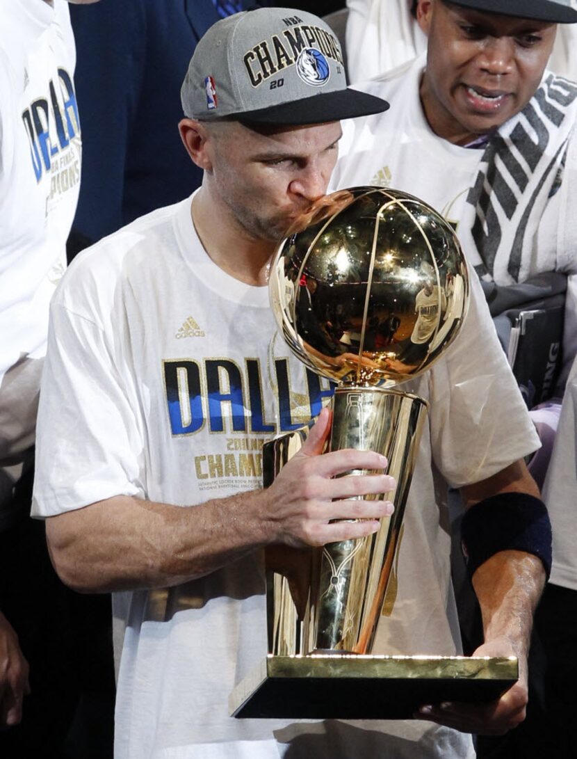 FILE - In this June 12, 2011 file photo, Dallas Mavericks' Jason Kidd kisses the...