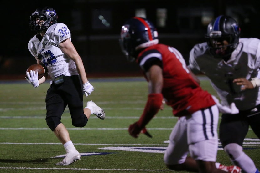 Hebron fullback Mark Scott runs a 37-yard reception to the 4-yard line in the fourth quarter...