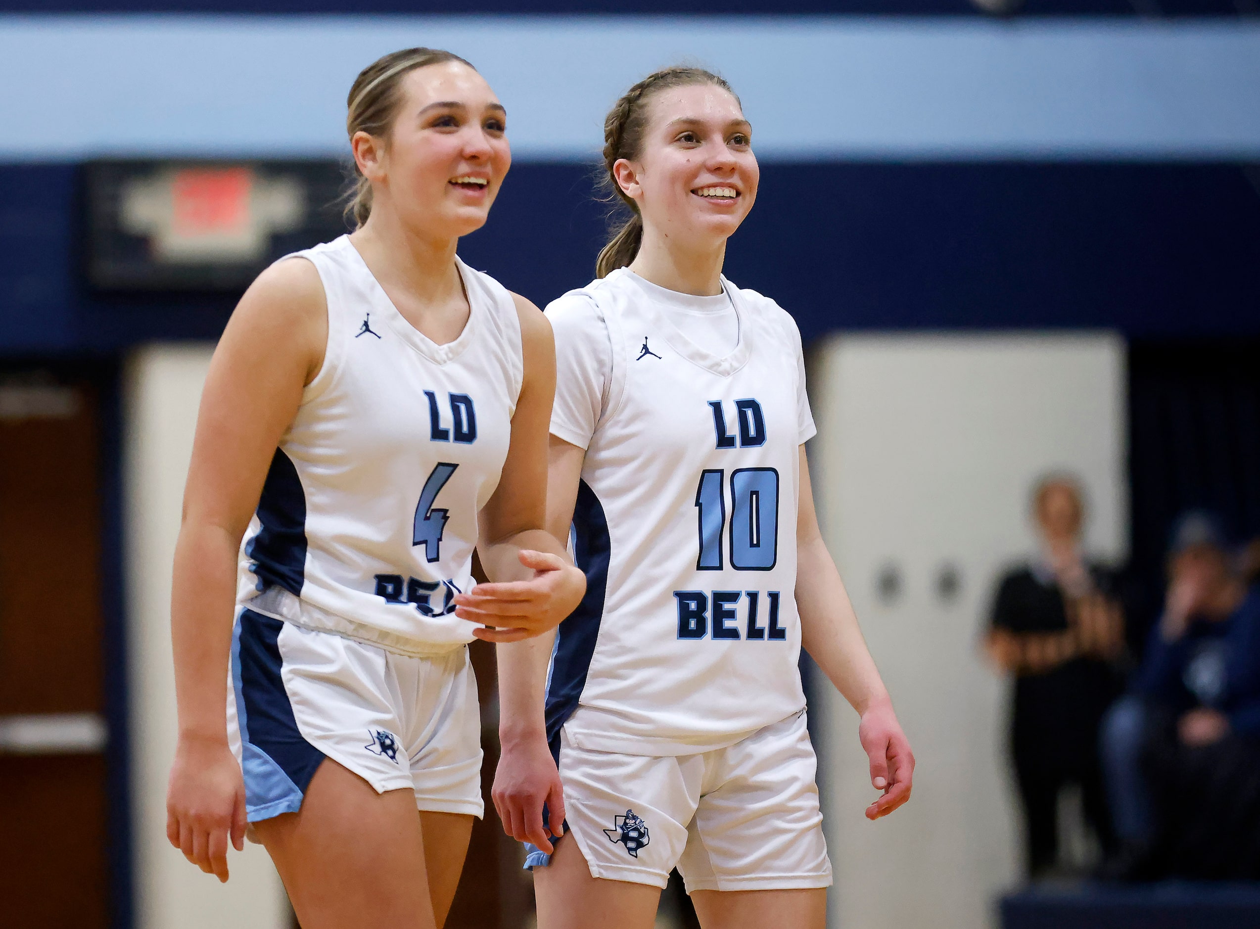 Hurst L.D. Bell’s Gracie Schwartz (4) and Katelyn Tietjen (10) smile as they get out to a...