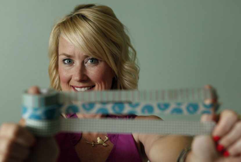 Cassie Freeman of Plano poses for a portrait holding washi tape at her home.