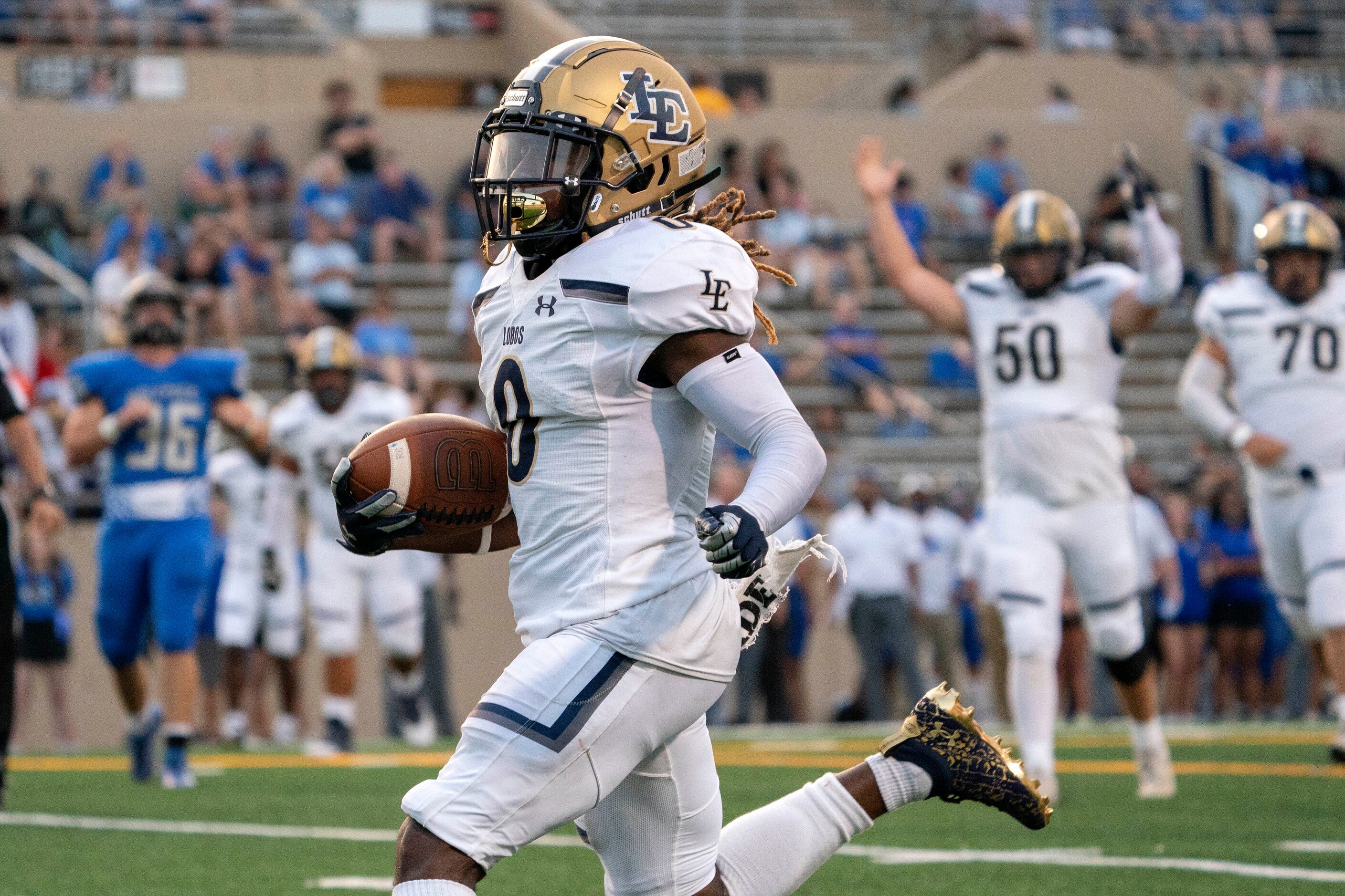 Little Elm senior wide receiver Cameran Taylor-Butler runs in for a touchdown during the...