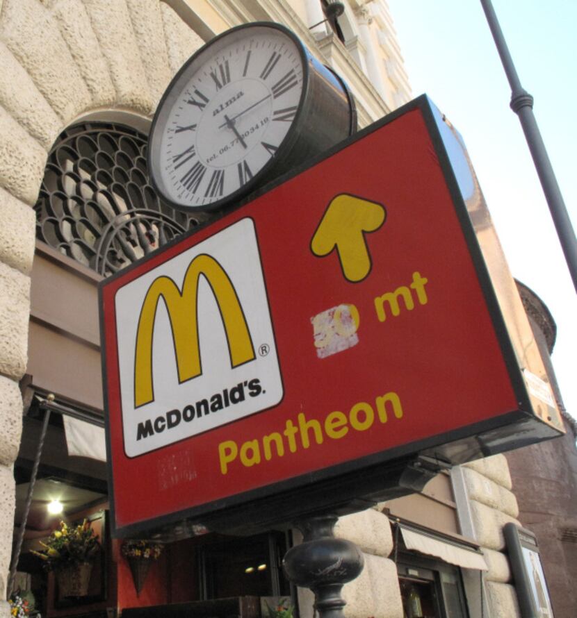 McDonald's: They're everywhere. This sign points to a location near the Pantheon in Rome. ...