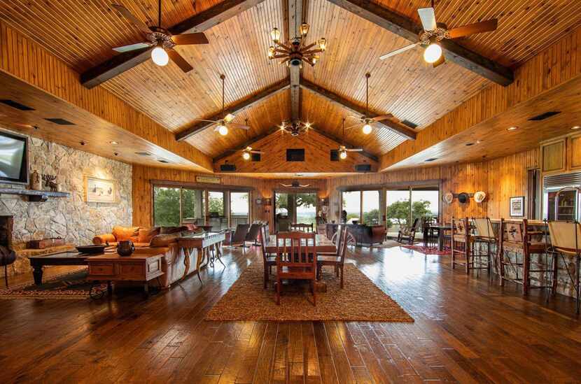 The three-bedroom ranch house includes a gym and banquet hall.