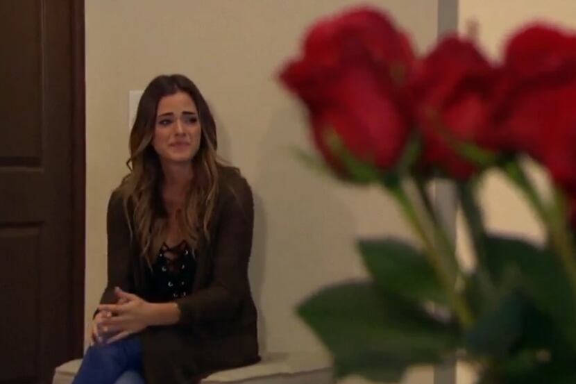 Dallas' JoJo Fletcher cries after receiving roses from an ex-boyfriend. She was bringing...