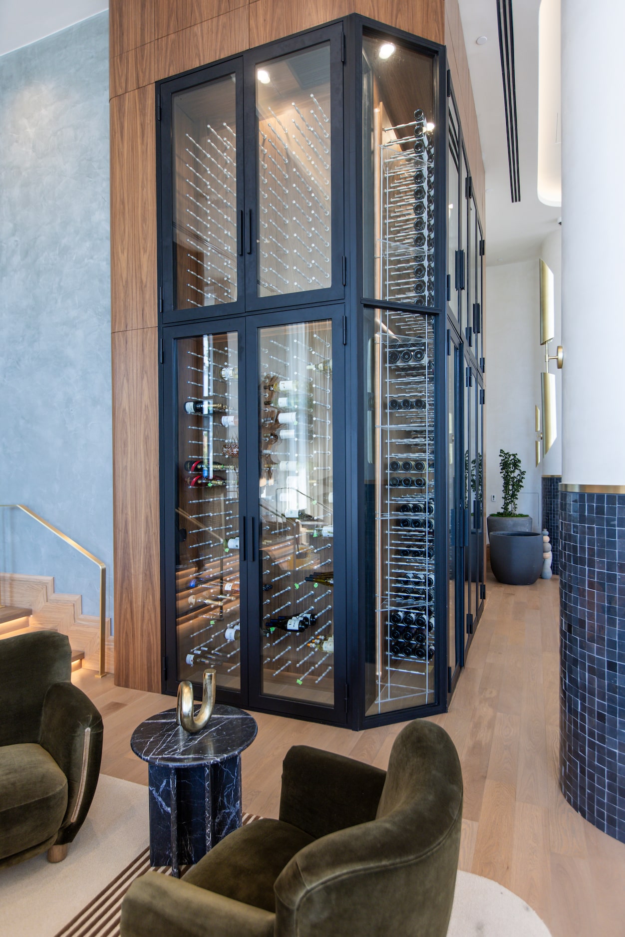 A 1,200-bottle, climate-controlled wine closet is located in the Palato lounge area.