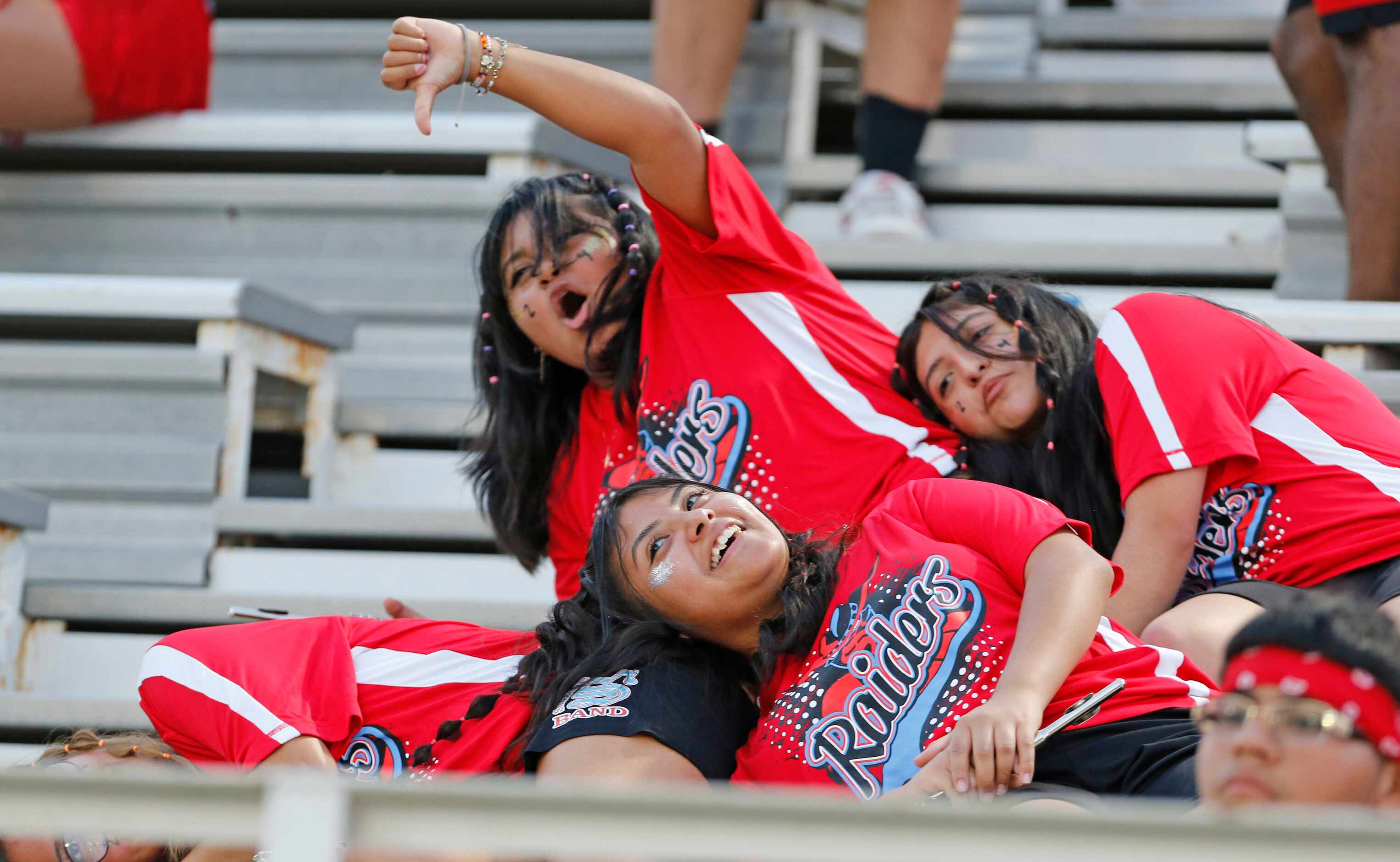 Members of the Skyline band ham it up during a break in the action during the first half of...