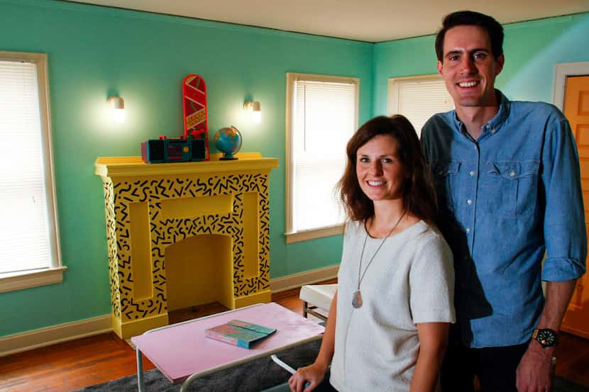 Owners Jeremy and Kelsey Turner in the living room of The McFly.  On the table: a Trapper...