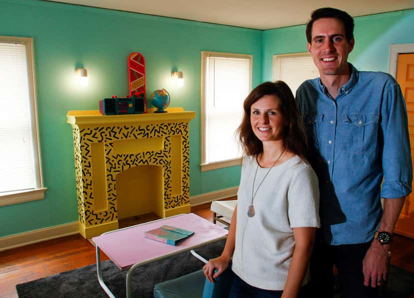 Owners Jeremy and Kelsey Turner in the living room of The McFly.  On the table: a Trapper...