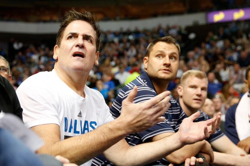 Dallas Mavericks owner Mark Cuban reacts to a call during the second period against the...