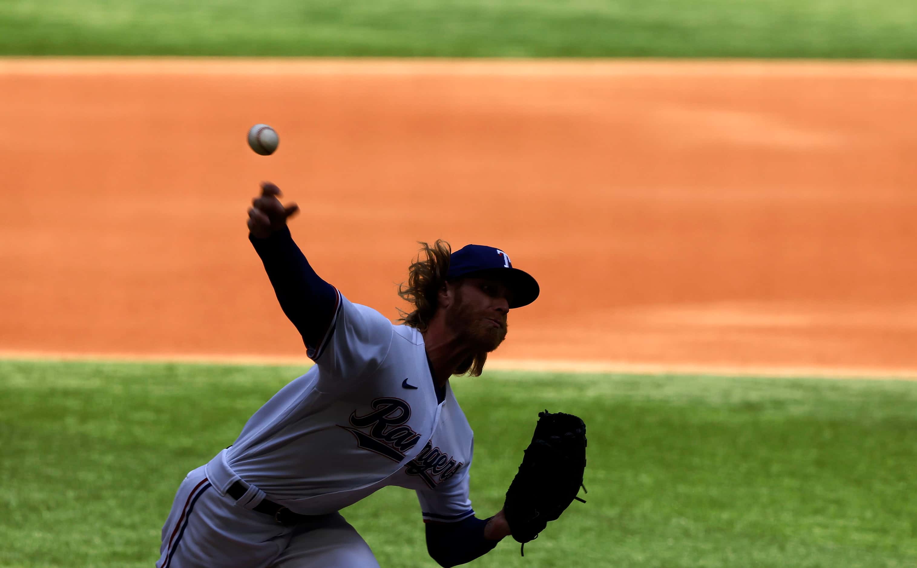 Texas Rangers starting pitcher Mike Foltynewicz (20) throws against the Toronto Blue Jays in...