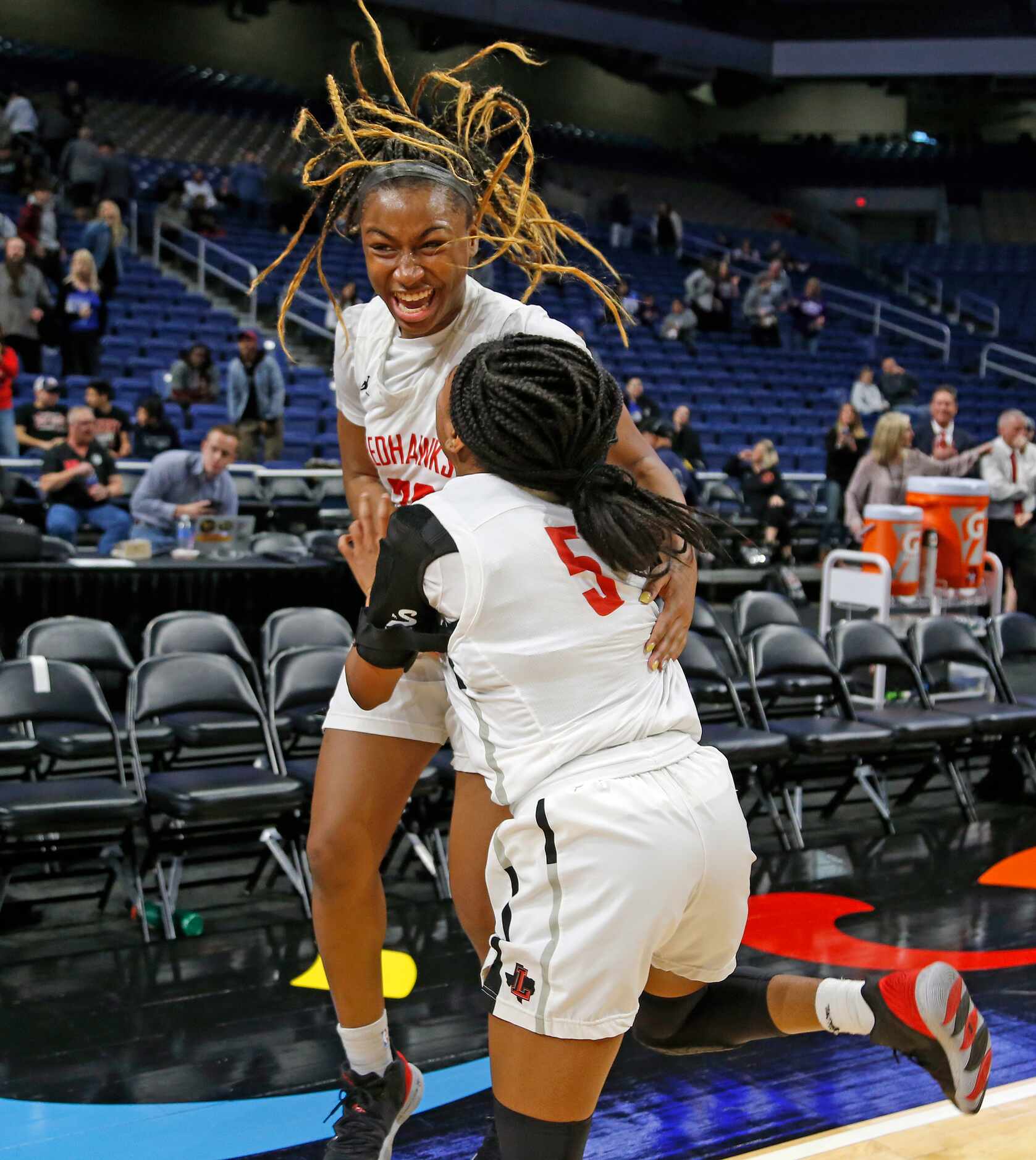 Frisco Liberty guard Jazzy Owens-Barnet #30 celebrates at the end of the game with Frisco...