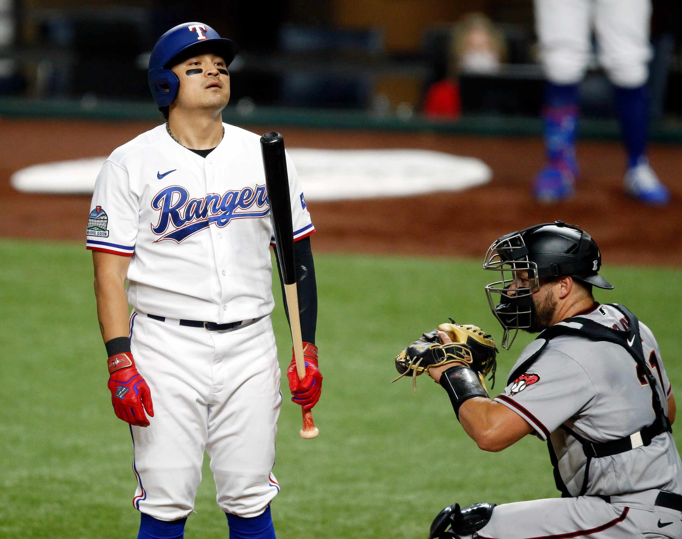 Texas Rangers left fielder Shin-Soo Choo (17) reacts to a called third strike to end the...