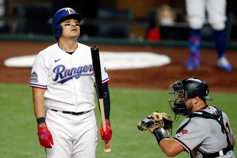 Texas Rangers left fielder Shin-Soo Choo (17) reacts to a called third strike top end the...